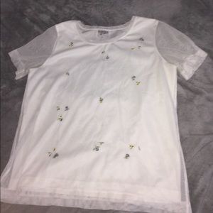 A blouse with flower patches, super cute!